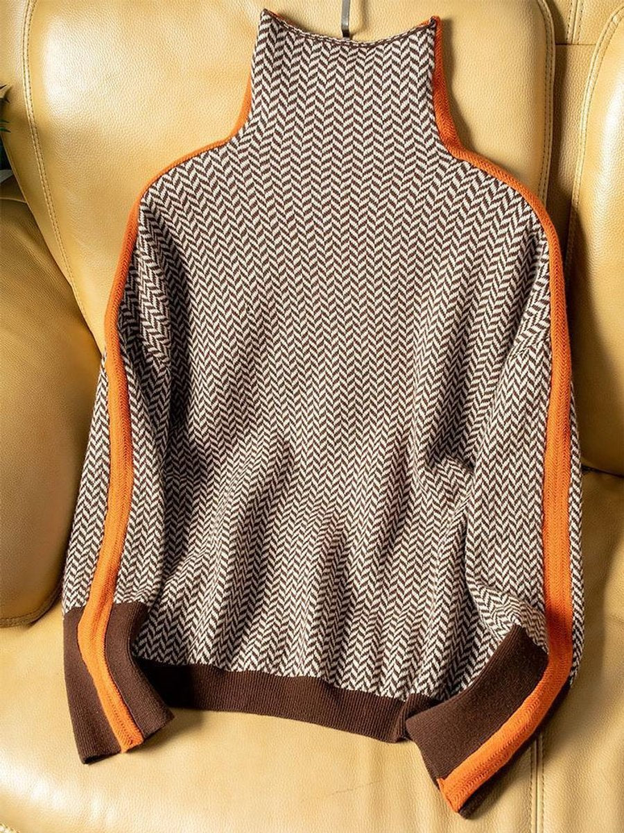 Chic women's houndstooth oversized turtleneck sweater. A cozy, long-sleeve knit statement for fall/winter.