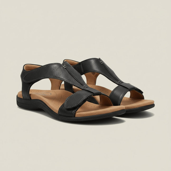 Close-up of adjustable velcro T-strap on women's orthopedic open-toe summer sandals.