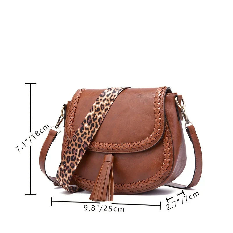 Elegant faux leather shoulder bag for women, complete with a distinctive tassel detail.