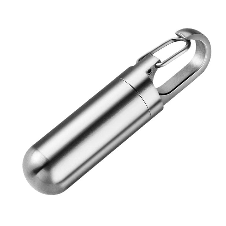 Portable waterproof pill box with keychain, ideal for daily essentials & travel medication.