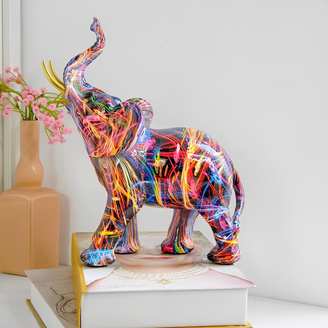 Elegant abstract elephant sculpture, modern resin art home decor accent.