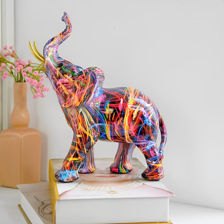 Elegant abstract elephant sculpture, modern resin art home decor accent.