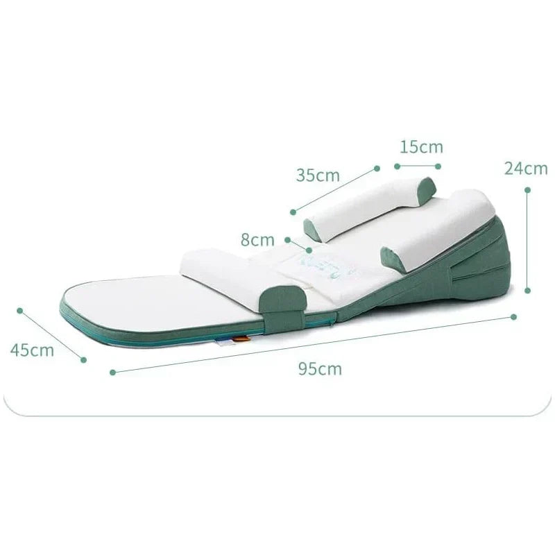 Washable baby anti-reflux wedge pillow for safe side sleeping, a practical & stylish nursery decor item.