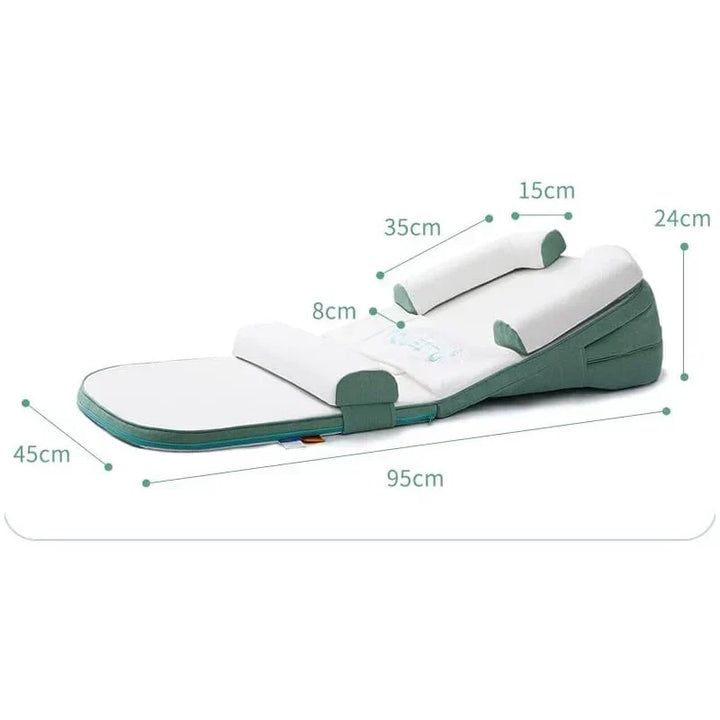 Washable baby anti-reflux wedge pillow for safe side sleeping, a practical & stylish nursery decor item.