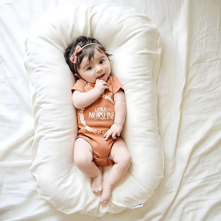 Soft cotton blend orthopedic pillow for babies, providing gentle, breathable support for comfortable infant care.