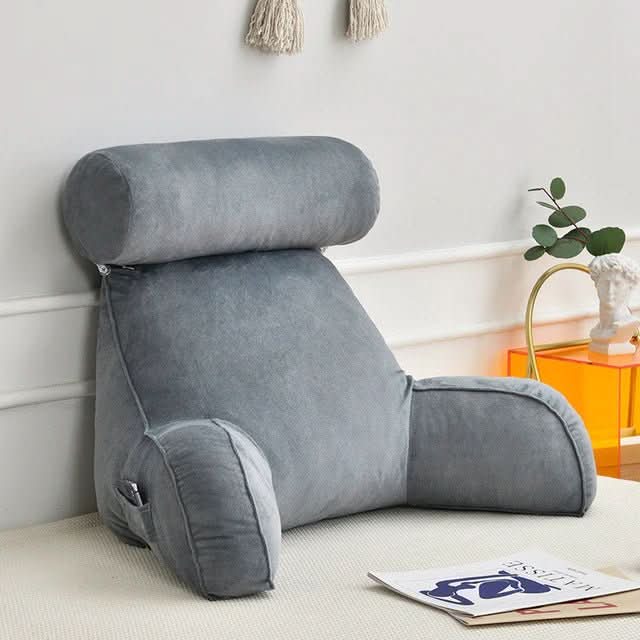 Unisex velvet reading pillow with arms & pocket for ultimate comfort. Memory foam backrest supports spine while reading.