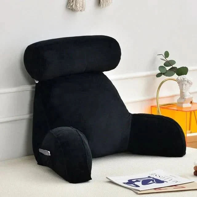 Adjustable headrest reading pillow with arm support & pocket. Luxurious velvet memory foam backrest for lounge or bed comfort.