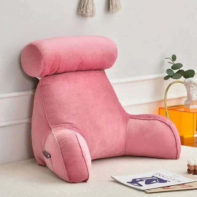 Portable reading pillow with arms, pocket, & memory foam backrest. Ideal lounge pillow for ultimate comfort while relaxing.