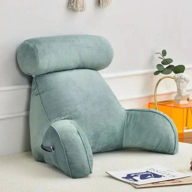 Ultimate comfort reading pillow: memory foam backrest with arm support & handy pocket. Perfect for reading, gaming, lounging.