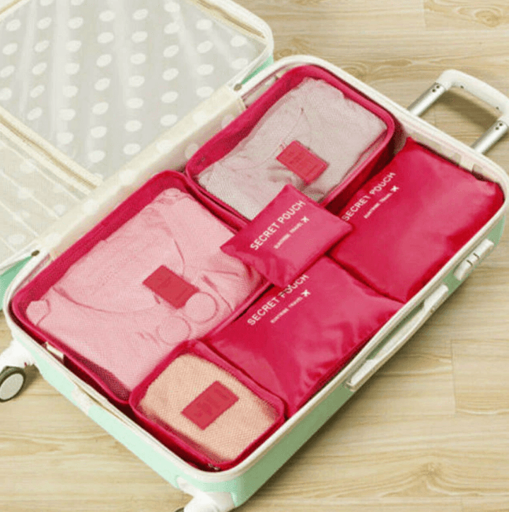 Luggage packing solution: multi-sized organizer set making travel preparation simpler and tidier.