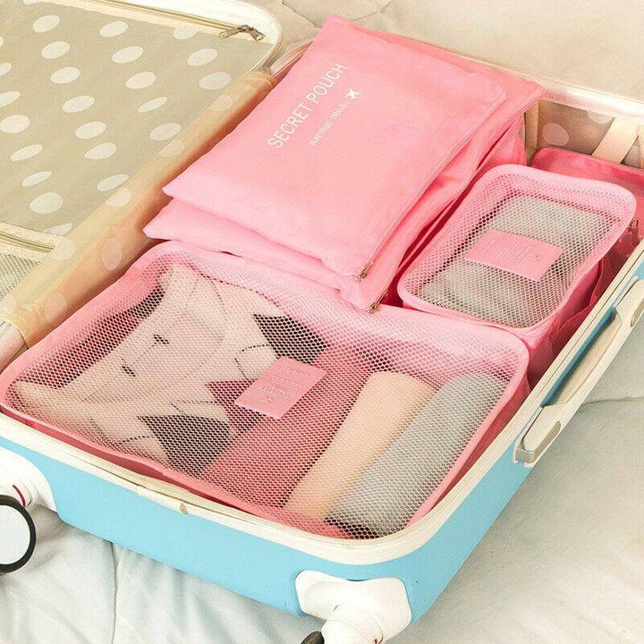 Complete travel packing cubes set, organizing clothes & essentials for any trip. Space-saving design.