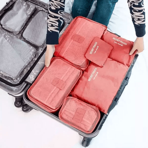 Unisex luggage packing organizer set for efficient, space-saving travel. Perfect for suitcases & travel bags.
