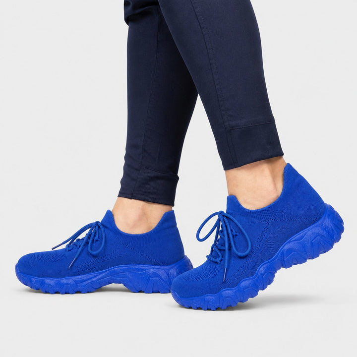 Women's casual wide toe footwear, orthopedic design for supportive walking comfort.