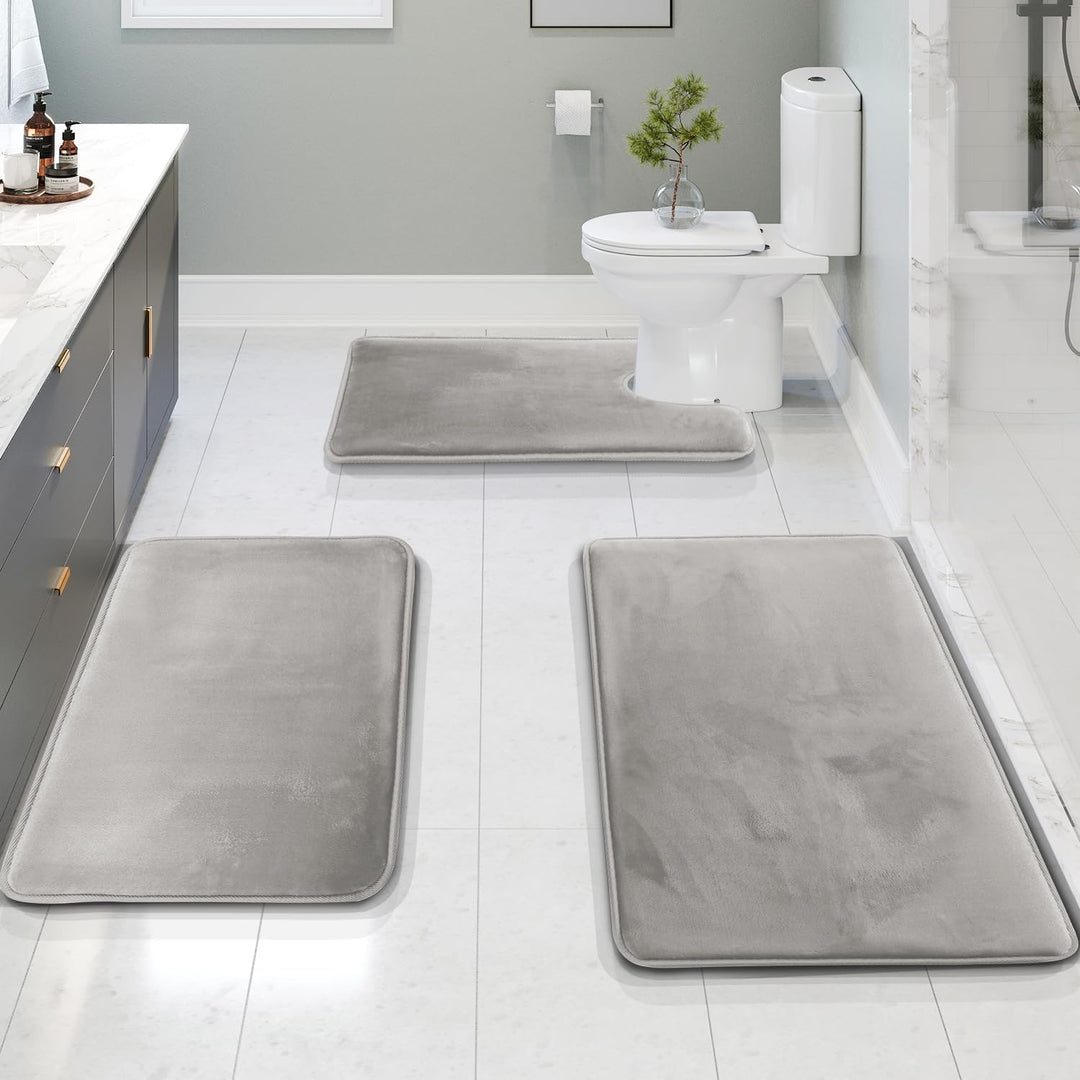 Machine washable 3-piece memory foam bathroom mat set. Durable, anti-slip bath rugs for easy care.