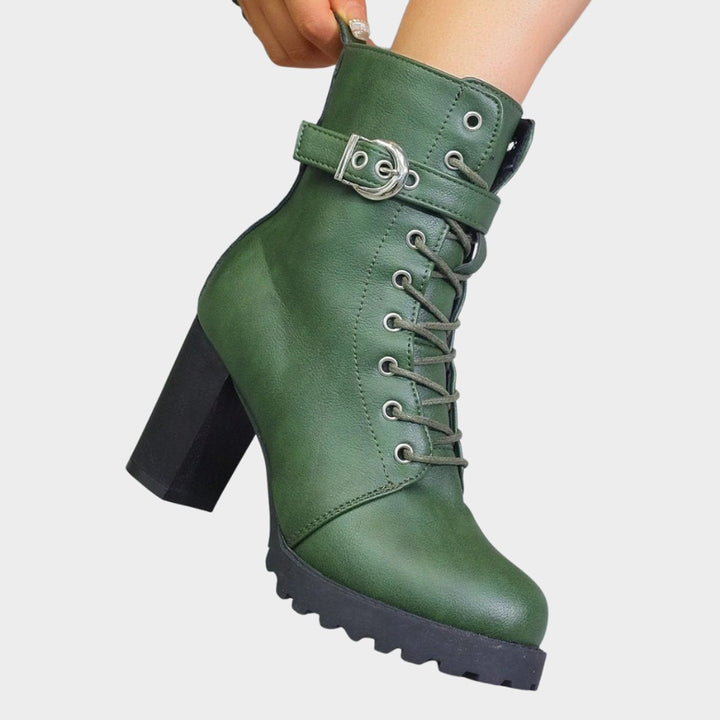 Chunky block heel women's lace-up combat ankle boots. Designed for edgy streetwear and comfort.