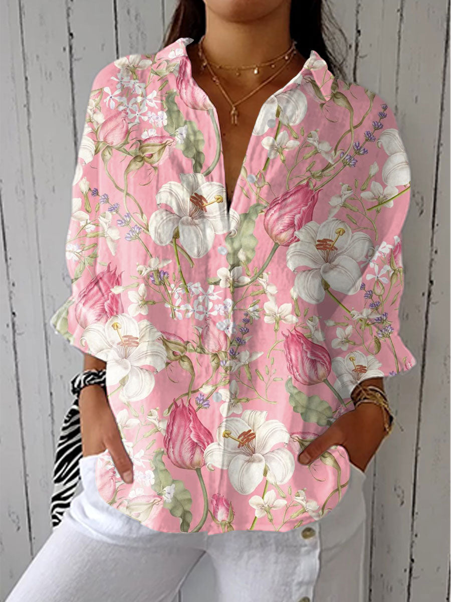 Elegant women's pink floral bloom print V-neck blouse, perfect for summer casual chic or romantic everyday wear.