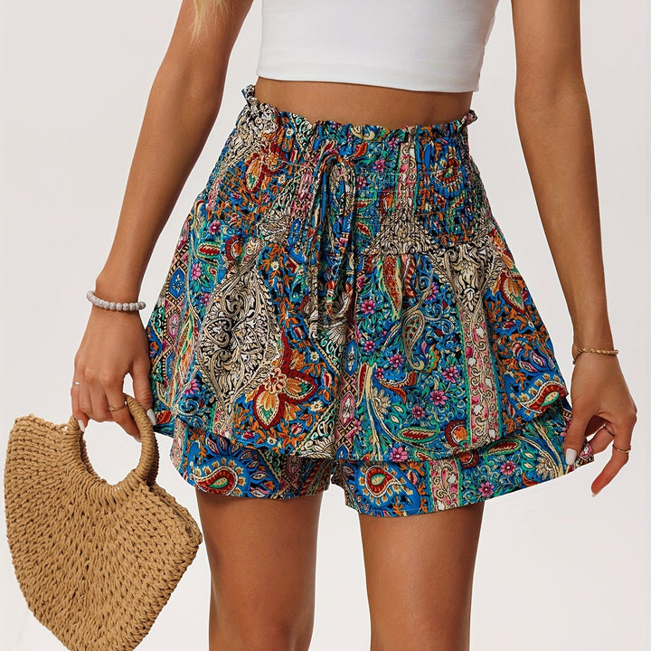 Casual women's floral summer shorts with a comfortable drawstring waist and cute ruffled hem detail.