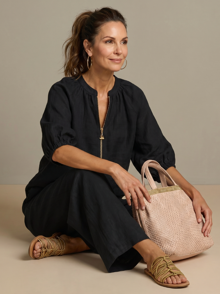 Women's two-piece set featuring a stylish zip-front blouson top.