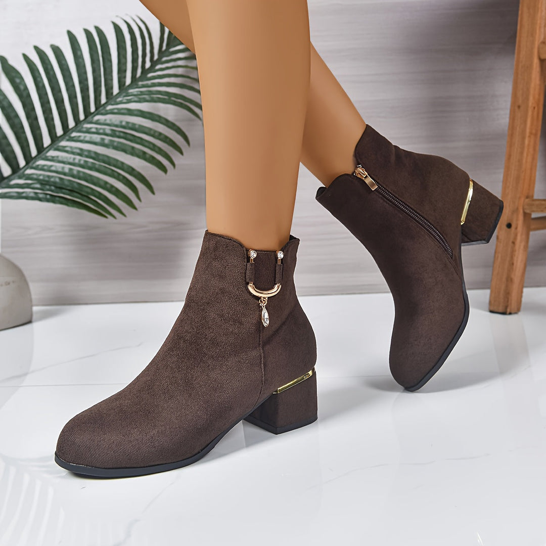 Front view: Women's chic brown Chelsea ankle boots, featuring almond toe & comfortable block heel.