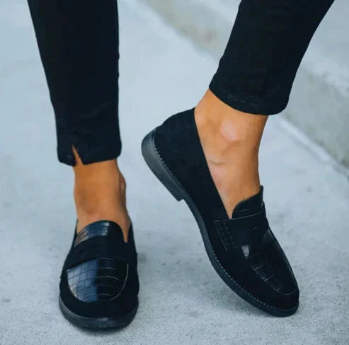 Stylish women's slip-on loafers featuring a unique textured design, providing supportive comfort for walking.