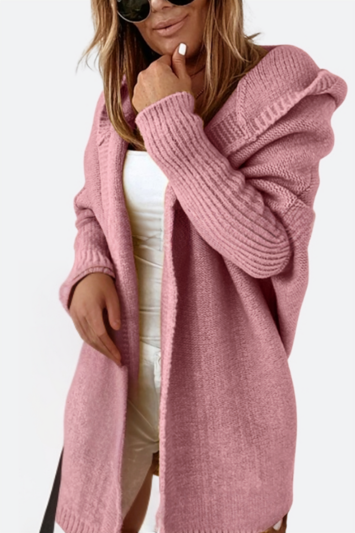 Layering women's knit cardigan, oversized with a hood for cozy comfort in autumn.