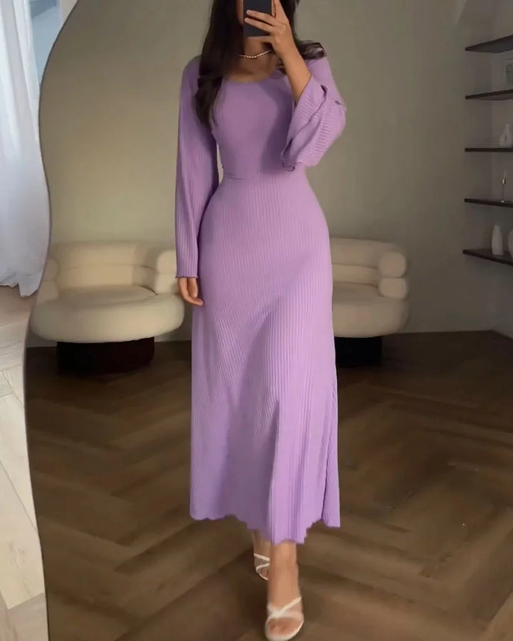 Elegant women's long-sleeve maxi dress, perfect for formal events & evening wear. Chic and modest.