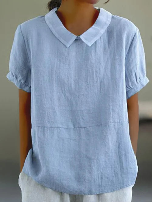 Women's elegant long-sleeve dress shirt, perfect for professional wear and a classic work blouse style.