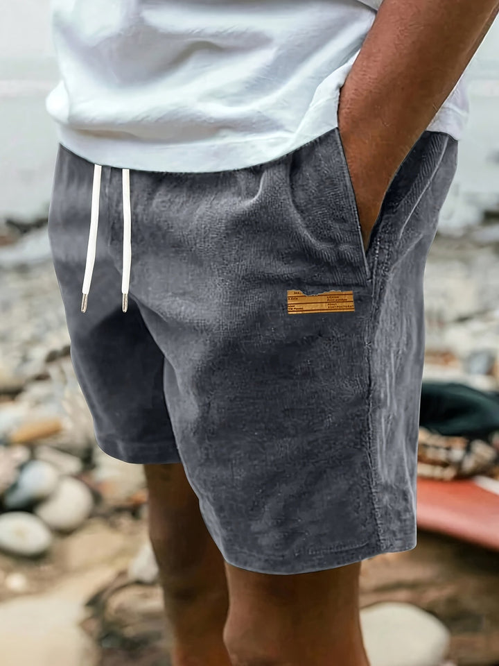 Deep sky blue men's drawstring shorts with pockets, offering comfortable versatile wear.