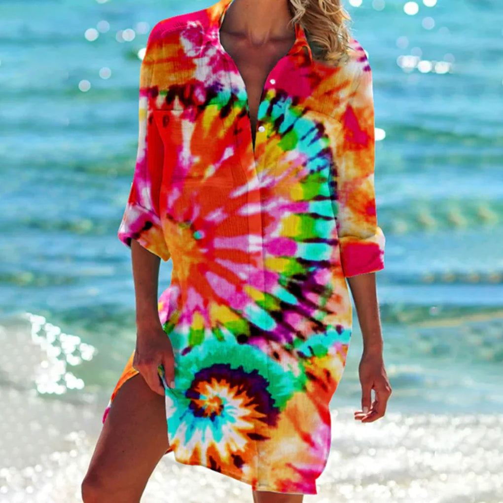 Women's vibrant tie-dye beach shirt, short sleeve, relaxed fit, perfect for summer vacation & resort wear.