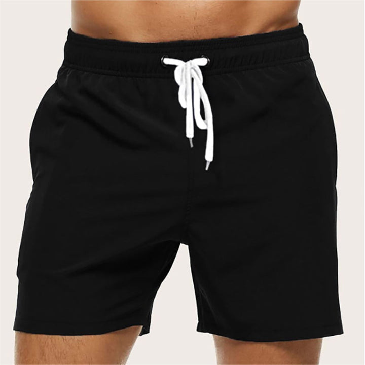 Versatile men's quick-dry swim shorts. Relaxed fit with drawstring, suitable for beach, pool, and casual summer.