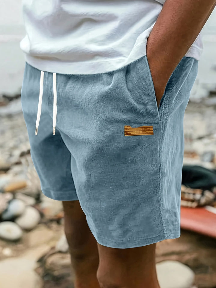Men's comfortable dark green drawstring shorts, relaxed fit for casual wear.