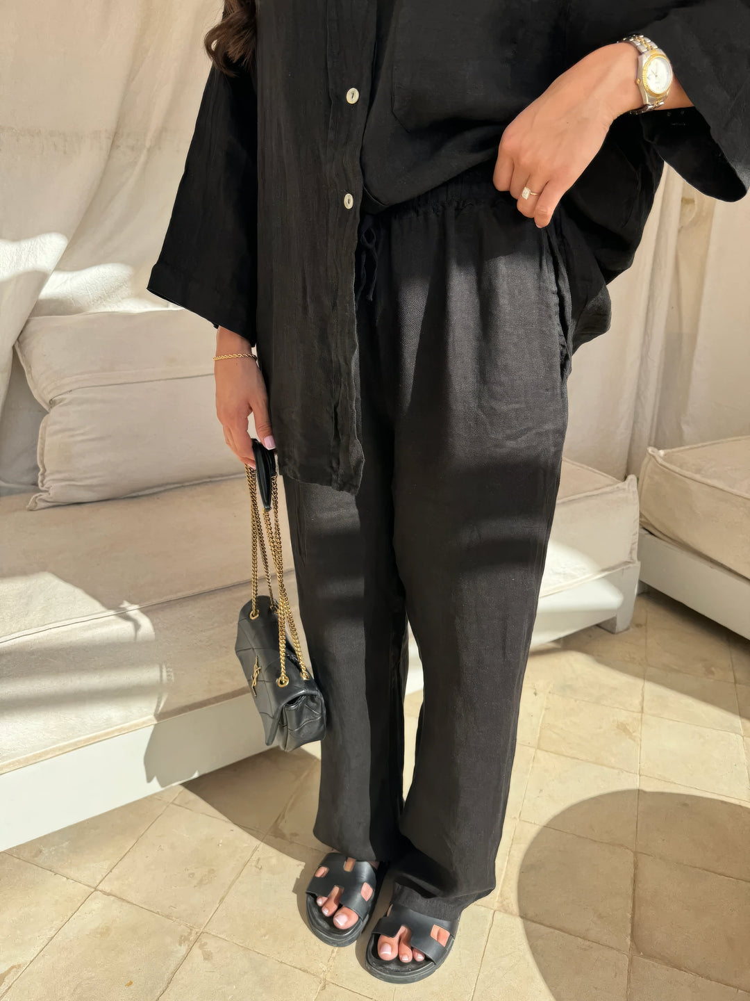 Stylish beige women's summer outfit, a two-piece set with long sleeve top and relaxed wide-leg pants.