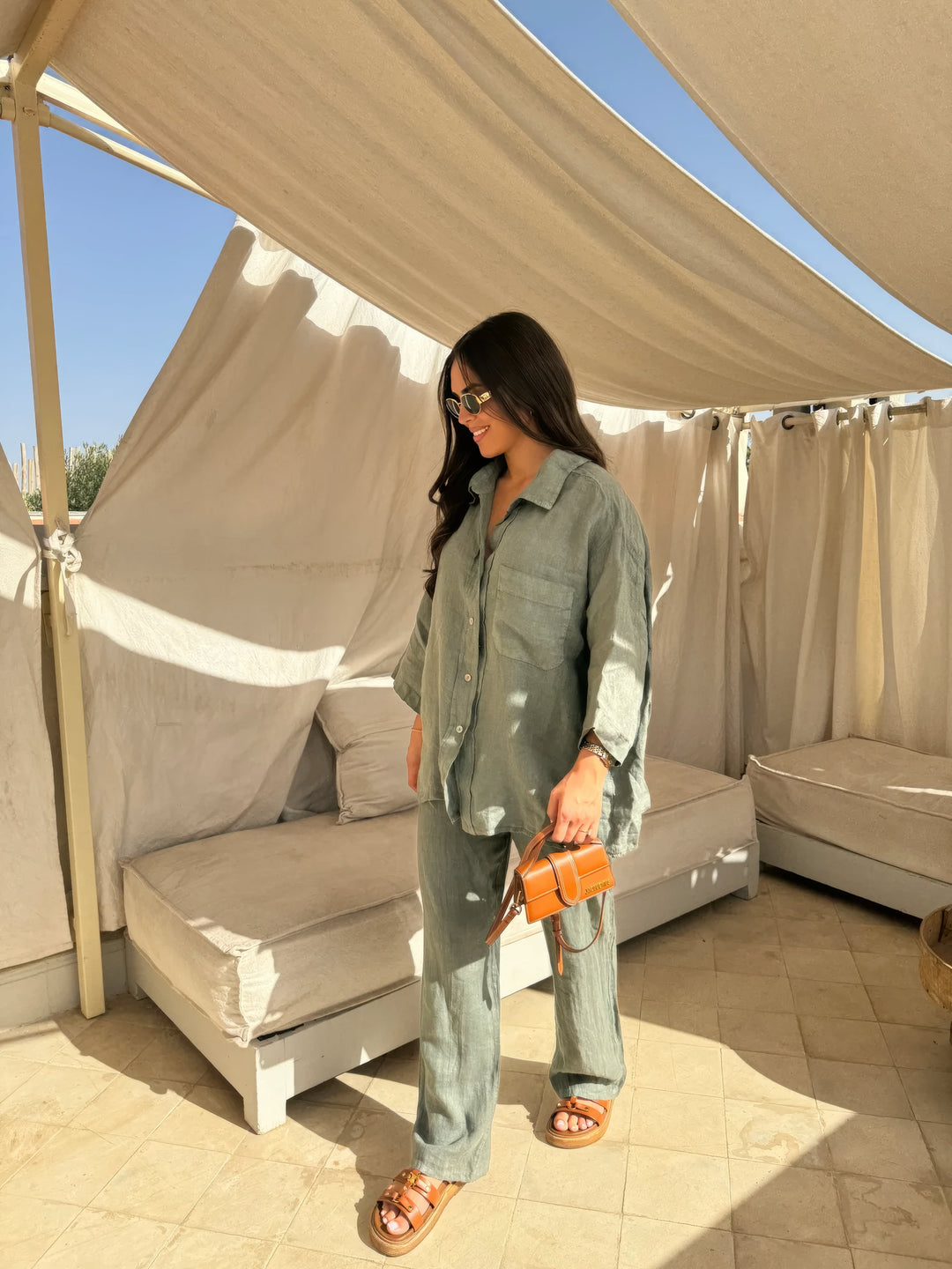 Relaxed fit green two-piece set for women, including a long sleeve top and wide-leg pants for summer comfort.