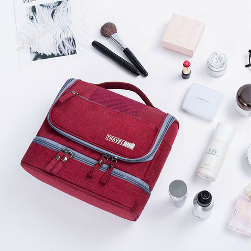 Spacious unisex multi-compartment hanging toiletry bag, perfect travel accessory for organized packing.