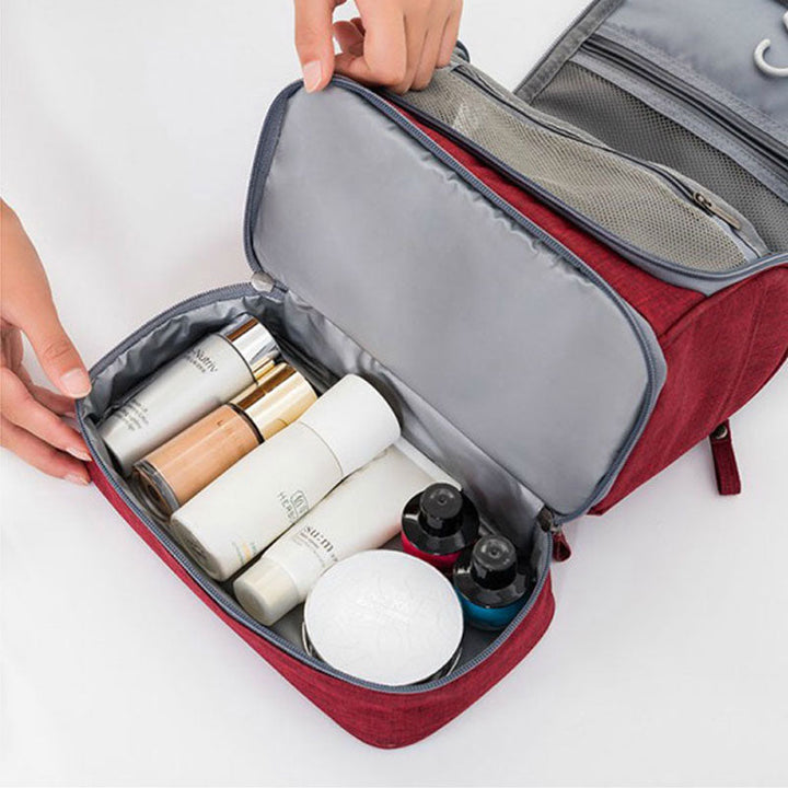 Unisex hanging travel bag for toiletries, makeup & cosmetics, featuring multiple compartments for easy access.
