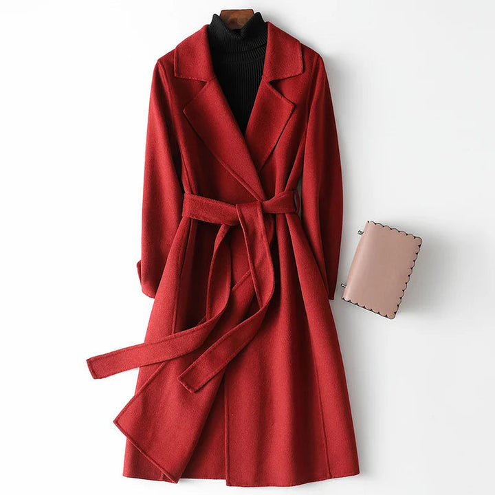 Elegant burgundy women's belted wrap coat with a sophisticated A-line silhouette, perfect for winter fashion.