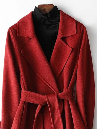 Stylish long women's wrap coat featuring a chic notch lapel and adjustable belt, ideal for versatile elegant outerwear.