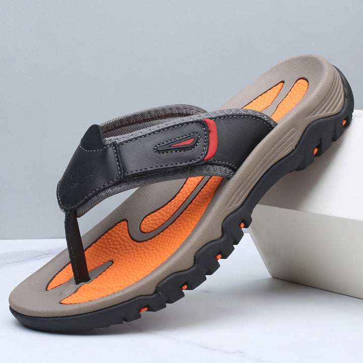 Stylish men's toe post slides with a realistic leather-look finish, great for everyday casual or beach footwear.