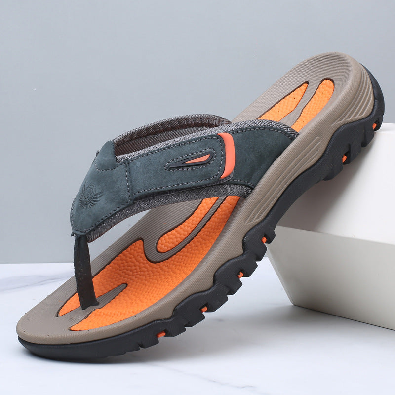 Durable men's casual toe post slides featuring a refined leather-look upper, perfect for relaxed summer days.