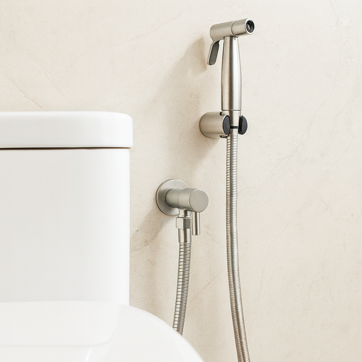 Stainless steel wall-mounted bidet sprayer for personal hygiene with adjustable water pressure control, eco-friendly.