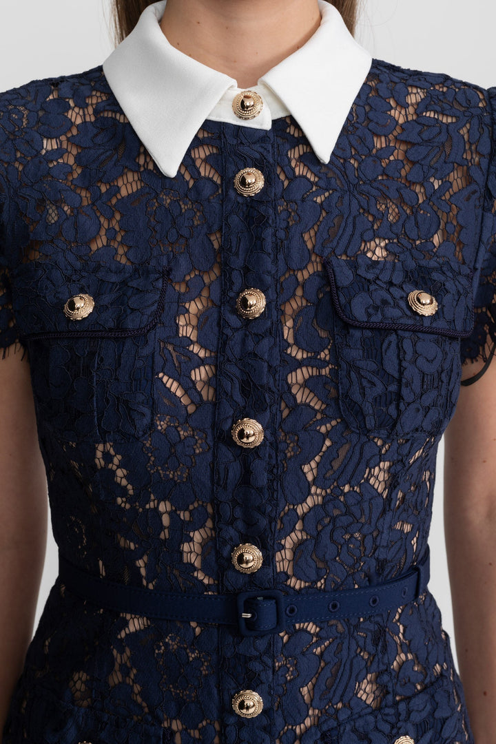 Stylish women's navy floral midi dress with a chic collar, perfect for an elegant party or daytime event.