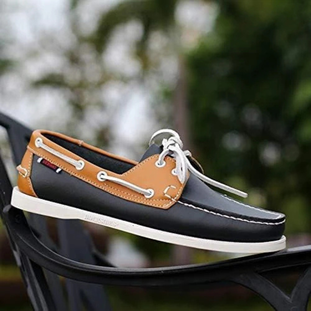 Men's two-tone lace-up boat shoes for stylish, casual summer wear and comfort on deck.