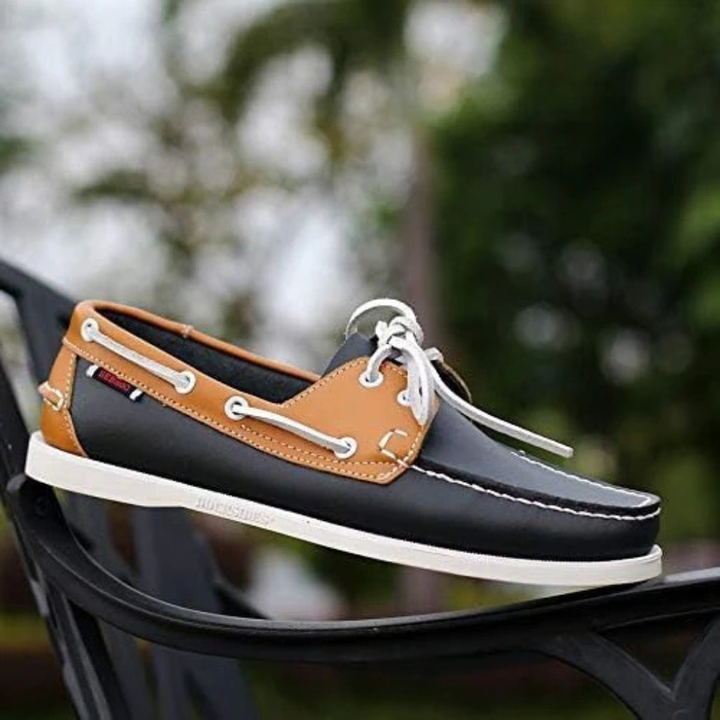 Men's two-tone lace-up boat shoes for stylish, casual summer wear and comfort on deck.