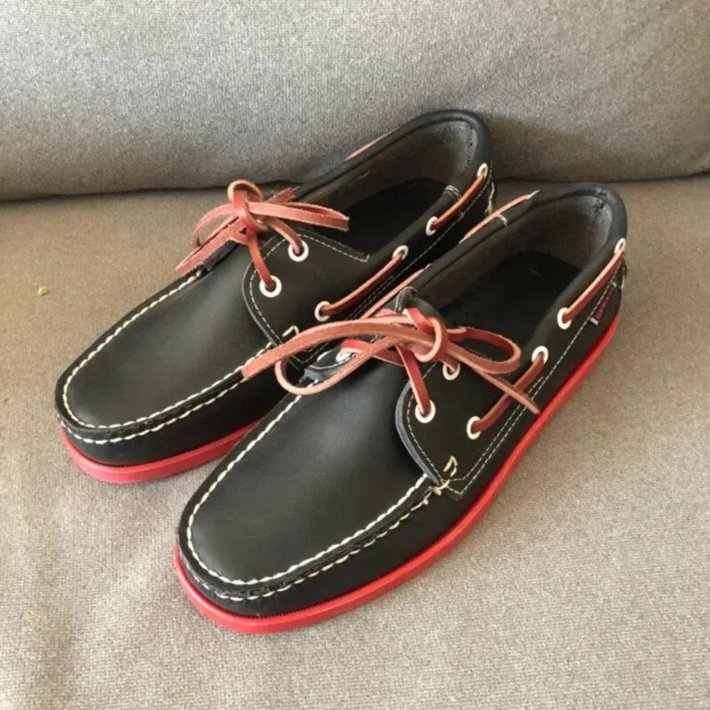 Stylish men's two-tone deck shoes, perfect for smart casual coastal style and summer comfort.