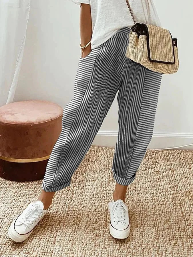 Flowy women's relaxed striped pants with elastic waist. Perfect for comfortable summer casual wear.