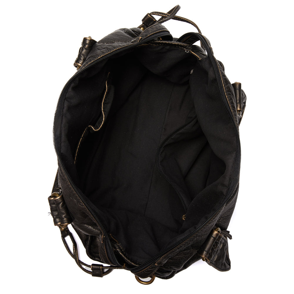 Versatile black women's everyday handbag. Stylish accessory for work or casual, can be shoulder or crossbody.