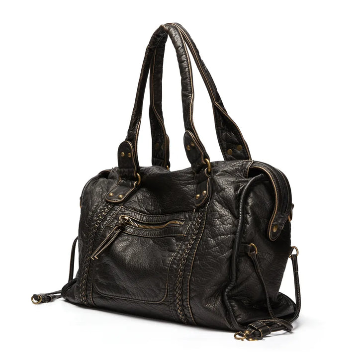Modern black women's everyday handbag. Secure crossbody purse, stylish accessory for class or daily errands.