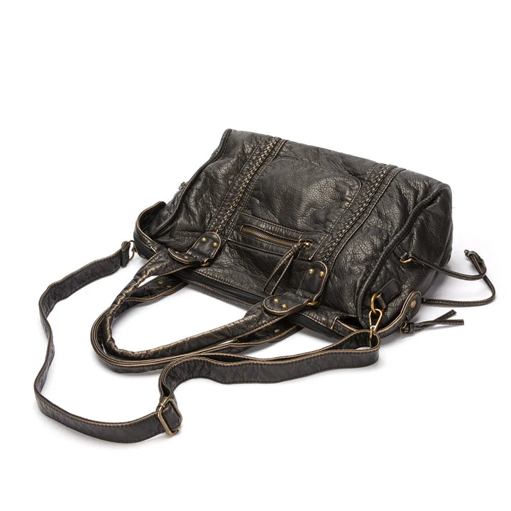Women's stylish black everyday purse. Functional & chic handbag with secure closure for all your essentials.