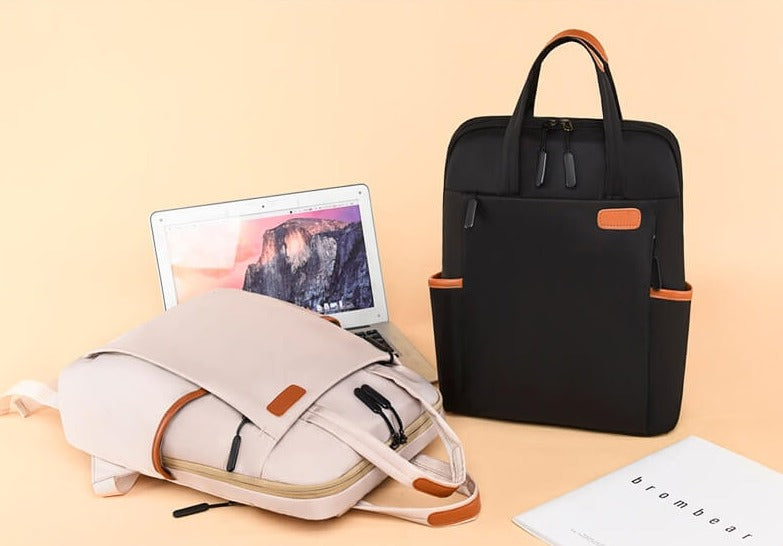 Secure anti-theft travel backpack in black, durable water-resistant Oxford for peace of mind.