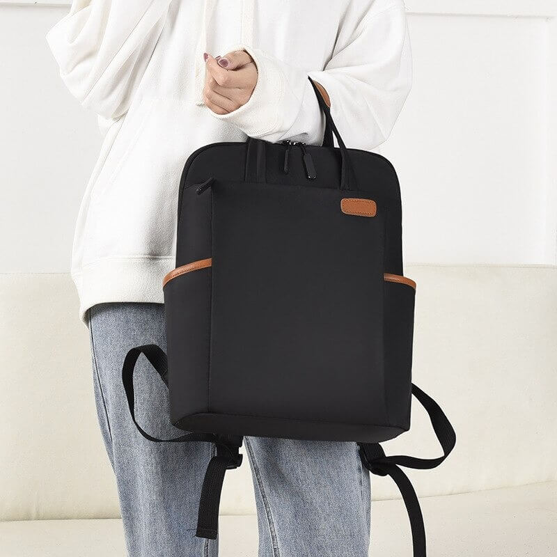 Water-resistant anti-theft commute bag in grey, perfect for daily secure travel.